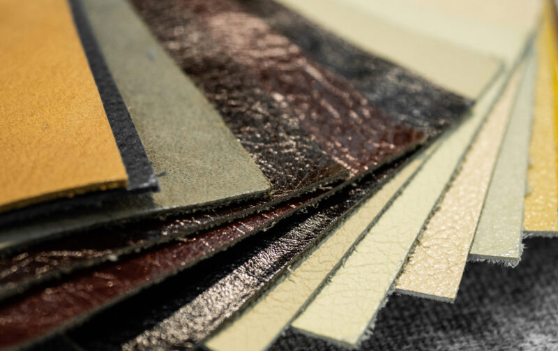 Luxury multicolored leather samples close-up. Can be used as background. Industry background.